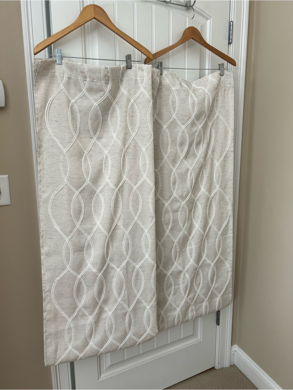 Pair of curtain panels -96” long. Beige linen with off white embroidery.